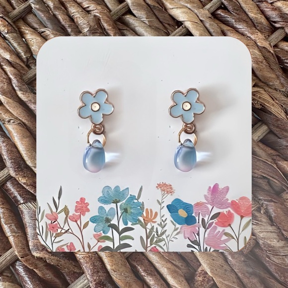 Handmade Jewelry - New Handmade light blue floral earrings with iridescent blue/purple "rain drop"